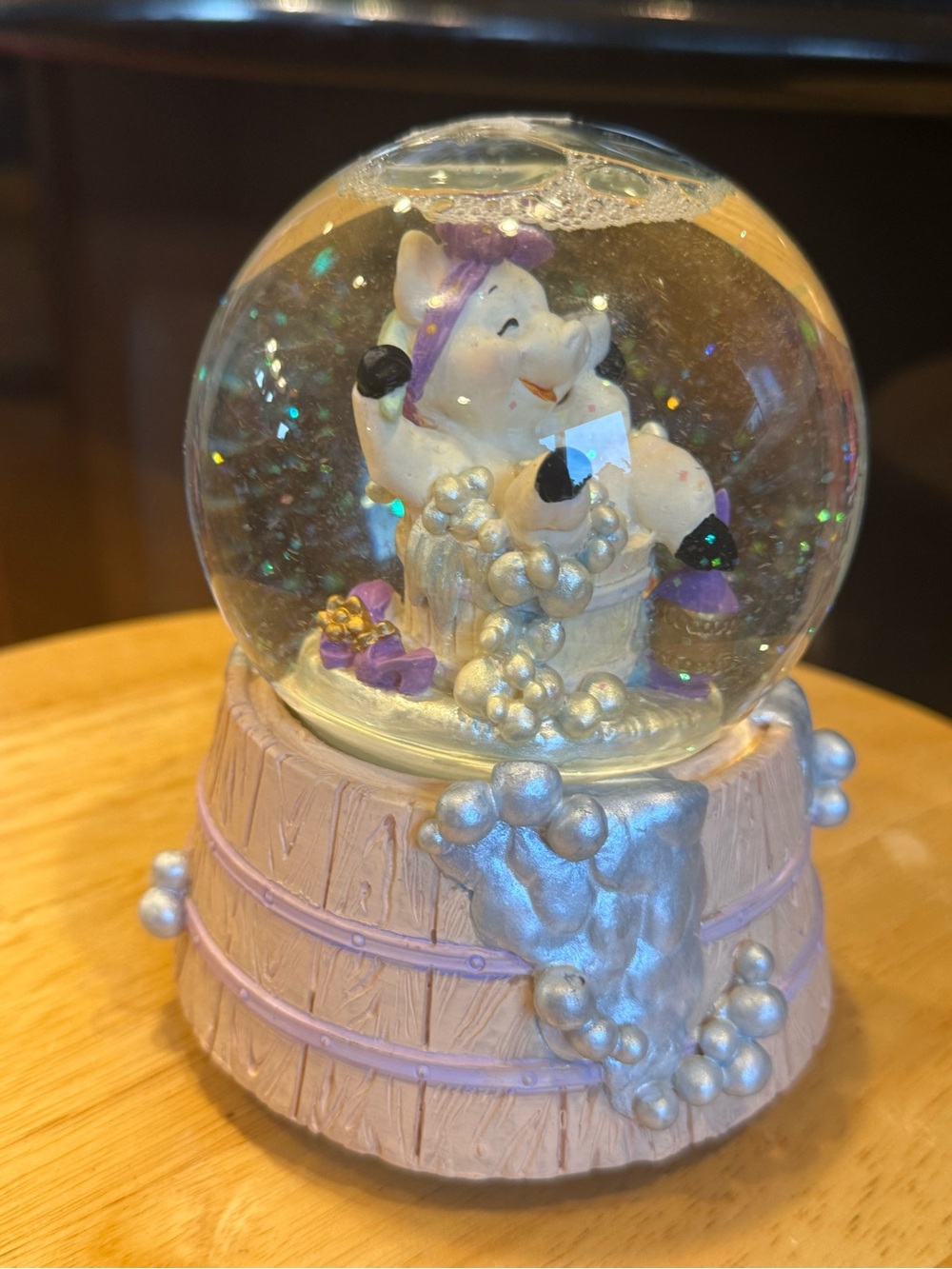 The San Francisco music box Pig Bath Splish Splash snow globe